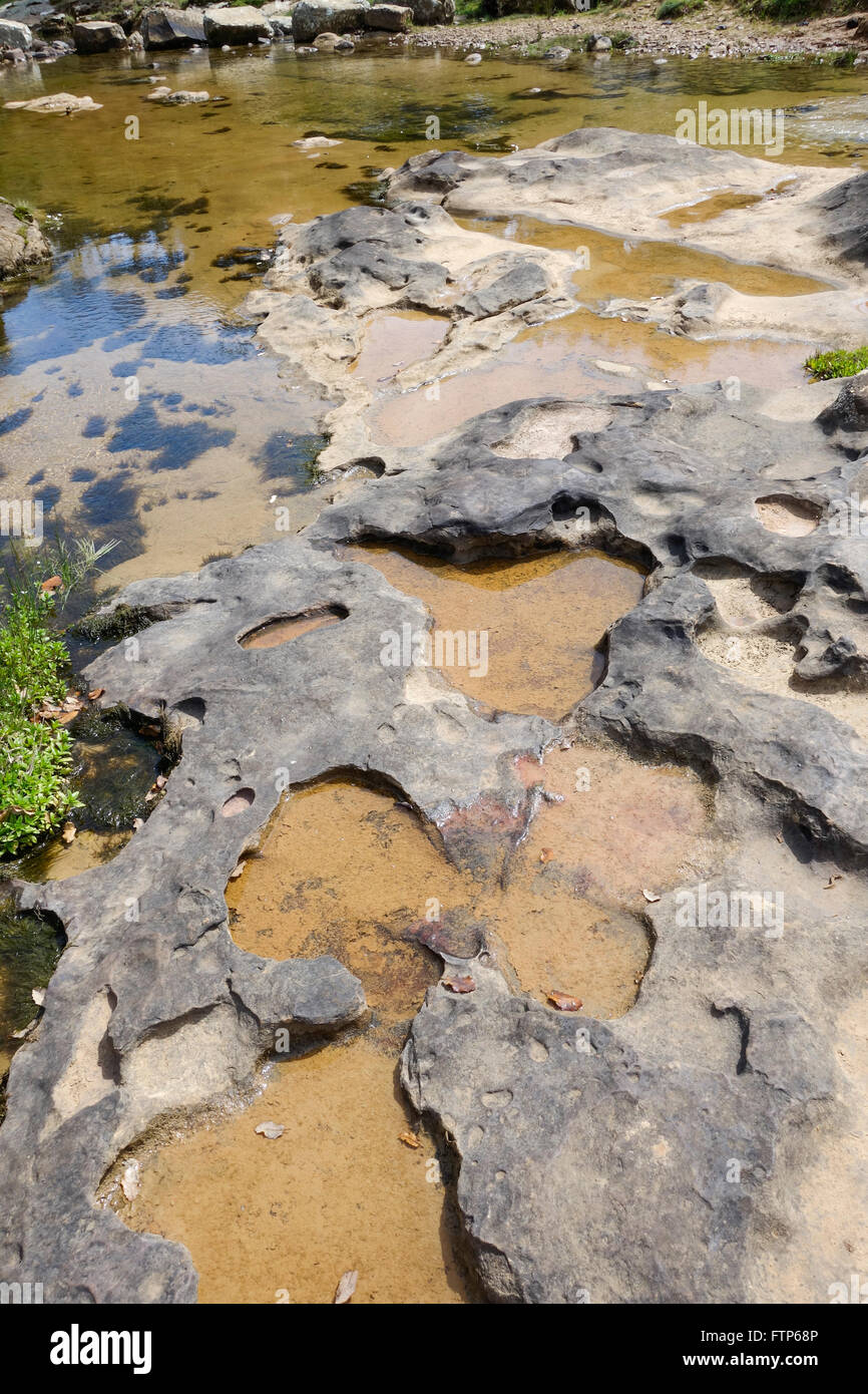 River bed erosion of limestone rocks in river forming puddles, Spain