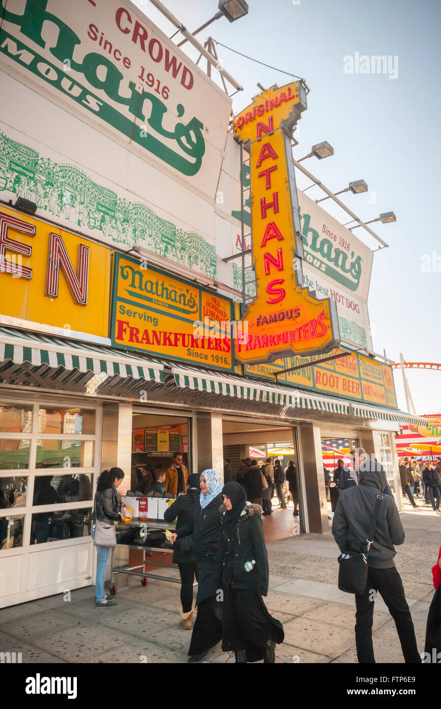 Visitors to Coney Island in New York on Saturday, March 26, 2016 stop at  Nathan's Famous restaurant. The iconic eatery was founded in 1916 has been in business 100 years. (© Richard B. Levine) Stock Photo