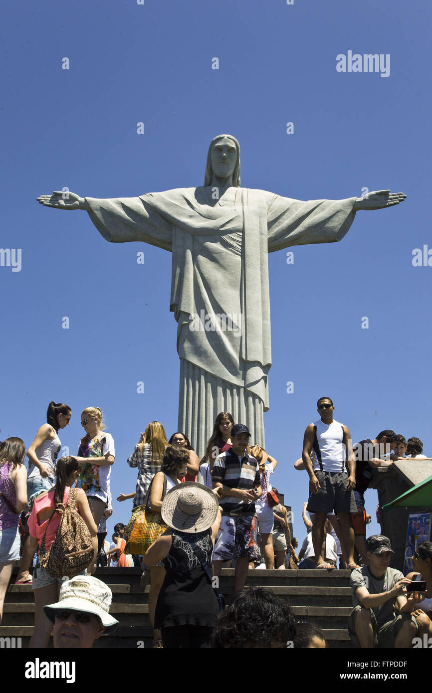 Tourists on the lookout of the Redeemer in Corcovado Mountain Stock Photo