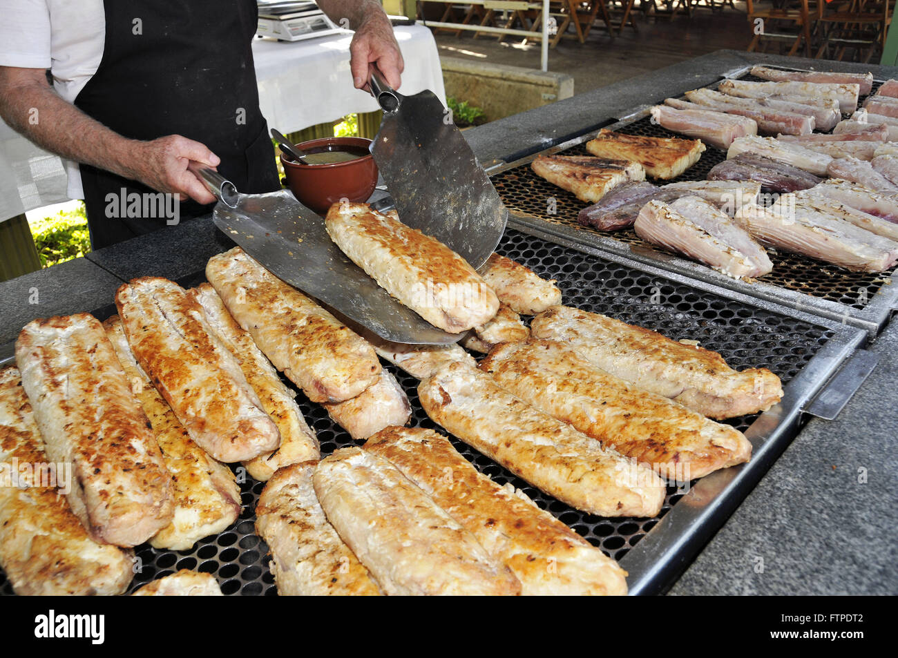 Grilled fish restaurant in the Beira-Rio Avenue - also known as the Street of Porto Stock Photo