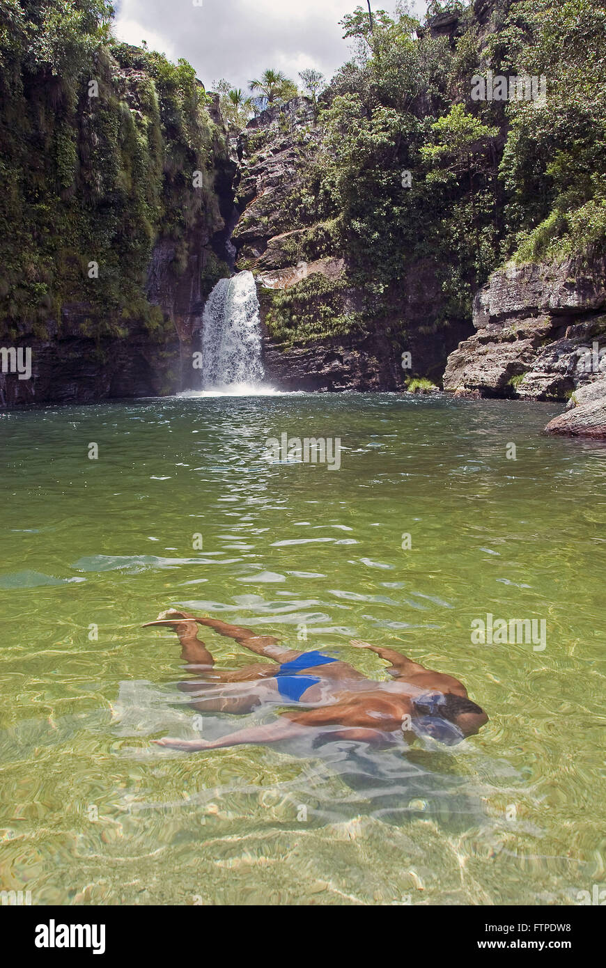Tourist swimming in natural pool in Rio Cachoeira King Silver City Cavalcante Stock Photo