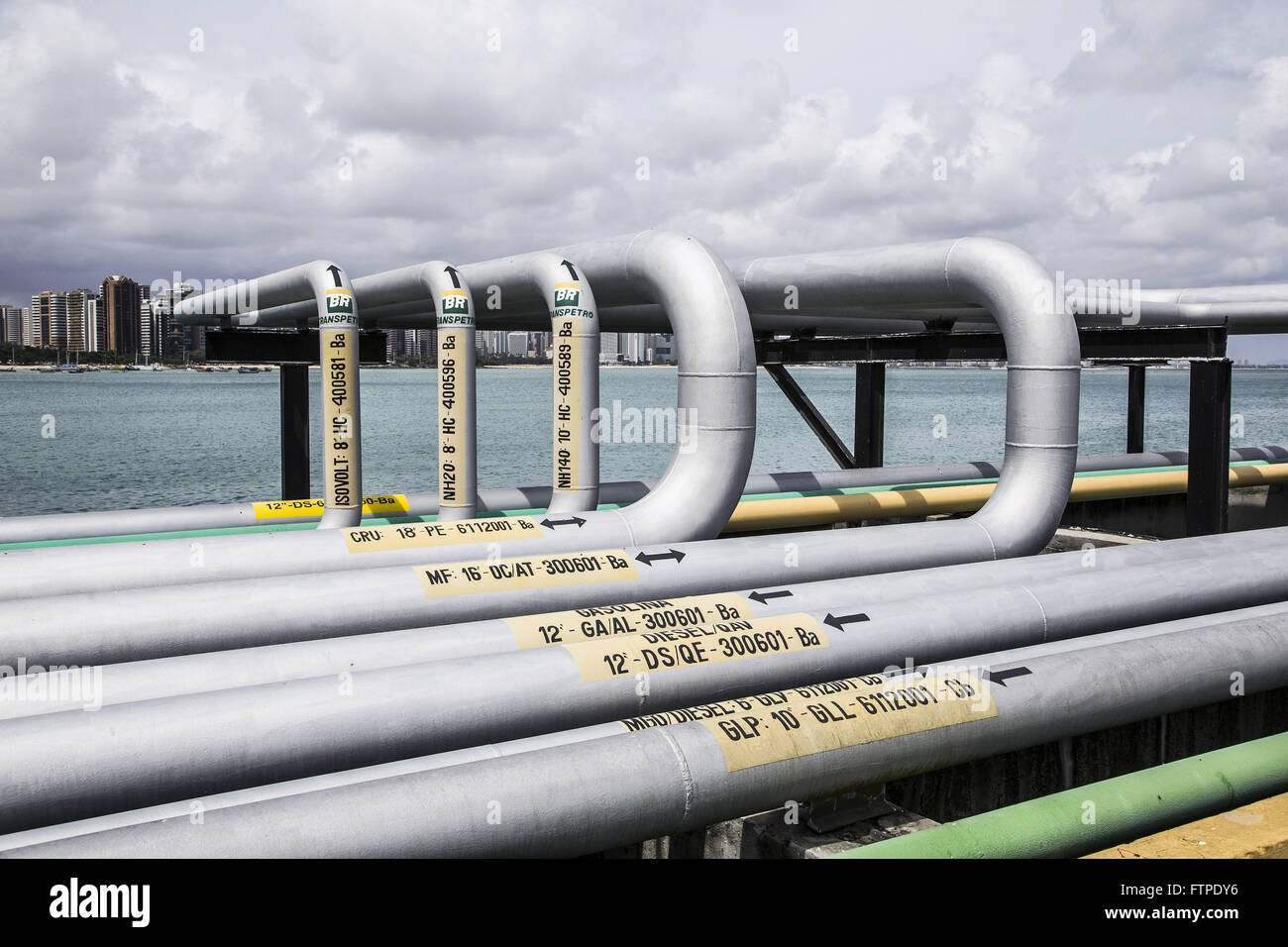 Pipelines of liquid and gas fuel tanker pier in the port Stock Photo