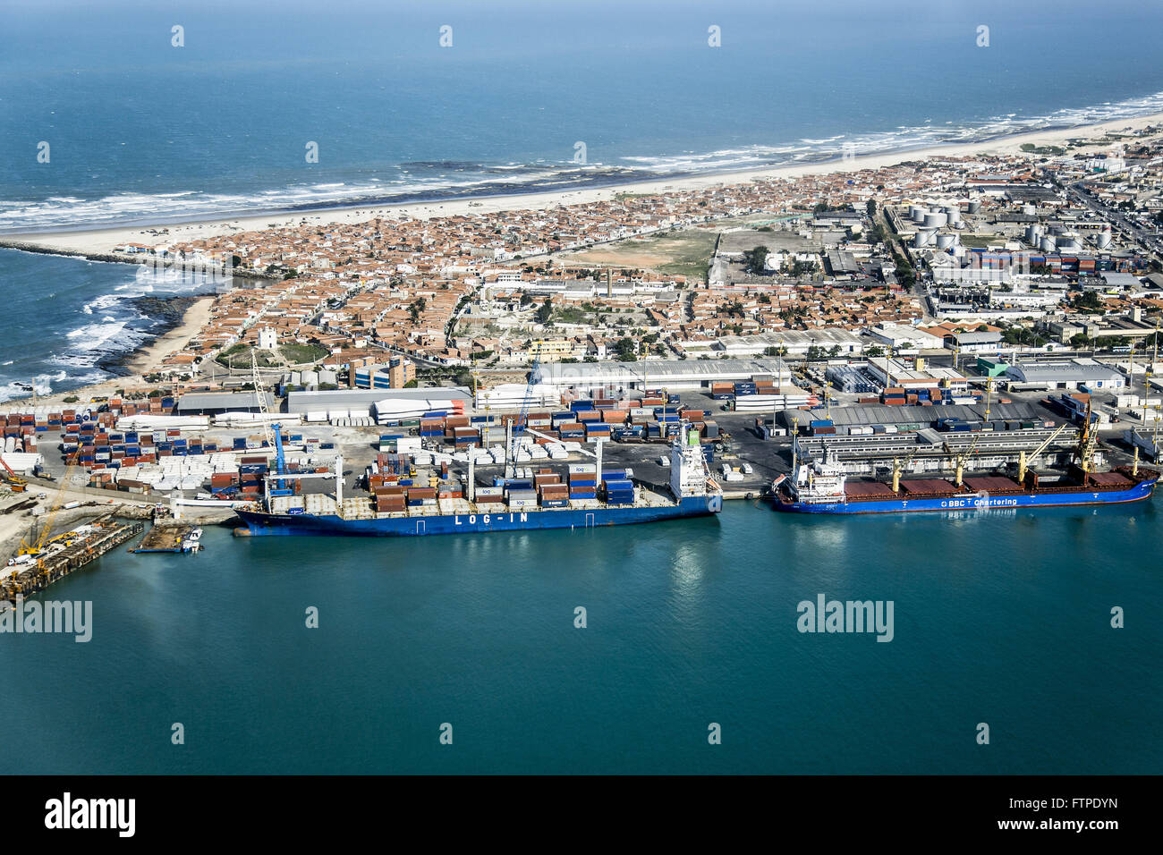 Aerial view of the commercial wharf in port with Futuro Beach in the background Stock Photo