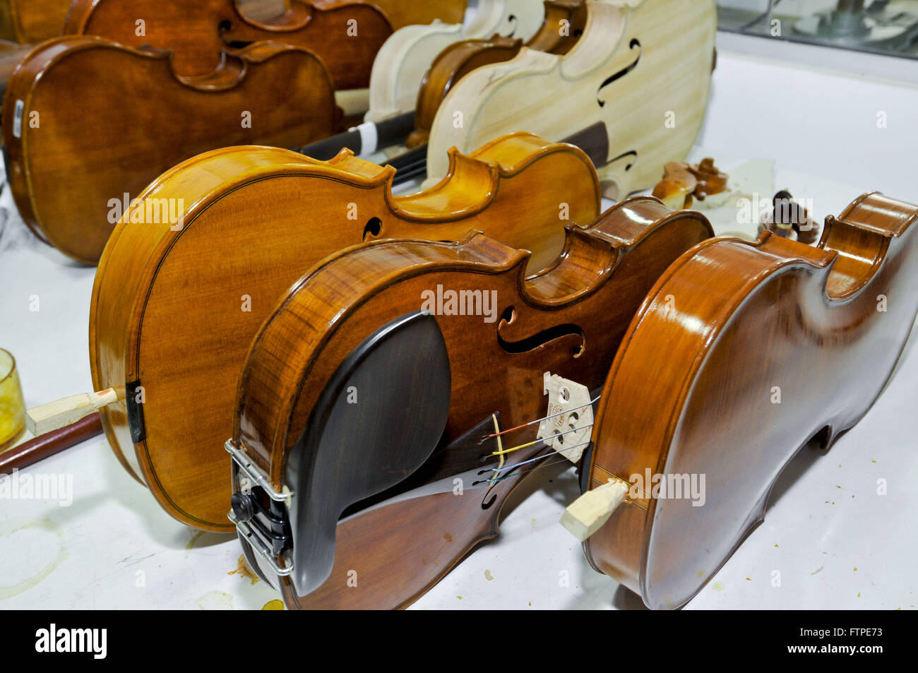 Violins in luteria Workshop - Handmade manufacture of stringed instruments Stock Photo