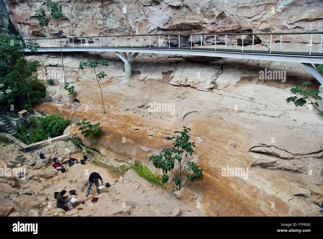 Archaeologists doing excavations in the Archaeological Site of Boqueirao Holed Stone Stock Photo