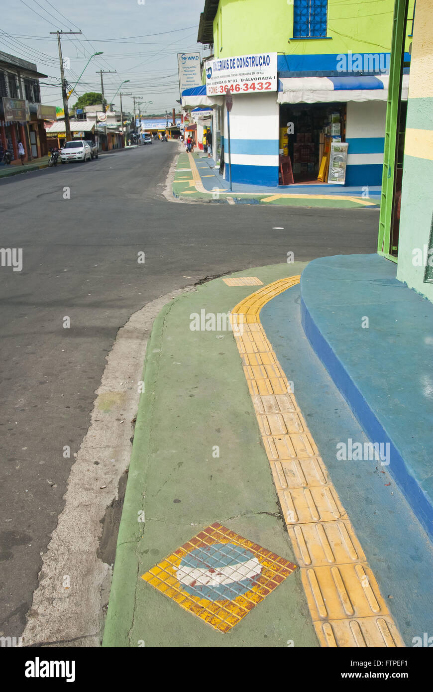 Causeway floored guide to visually impaired people in the city of Manaus decorated Stock Photo