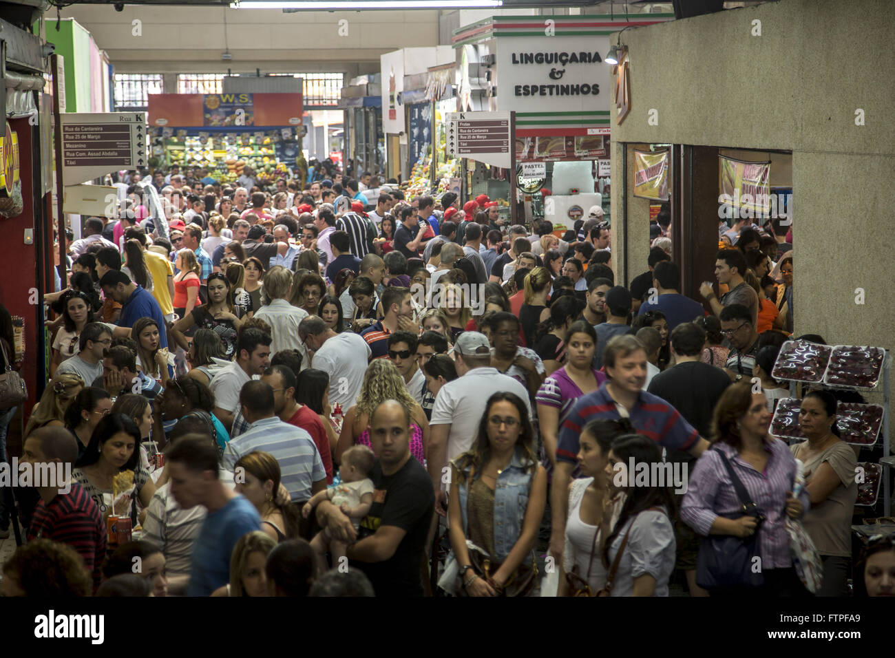 People in the Municipal Market of Sao Paulo - a tourist attraction opened in 1933 Stock Photo