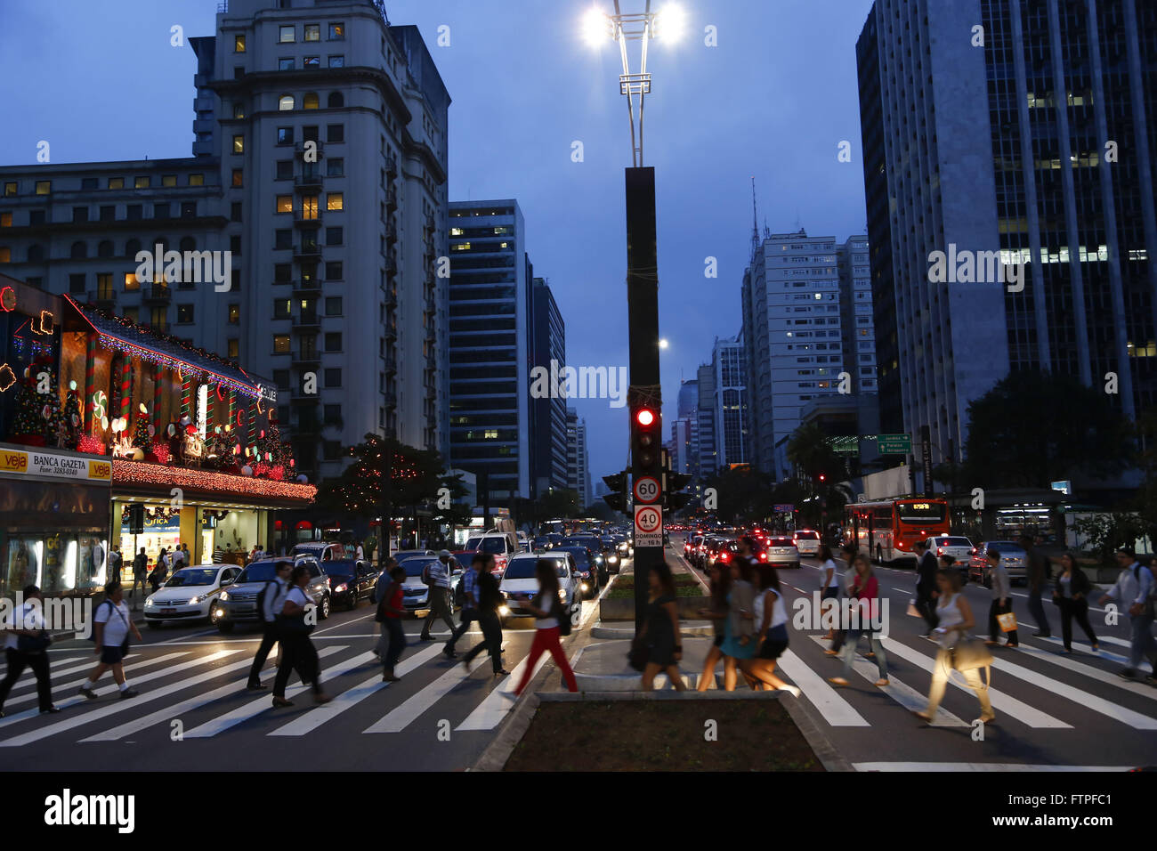 Pedestrian crossing on Paulista Avenue at dusk Stock Photo