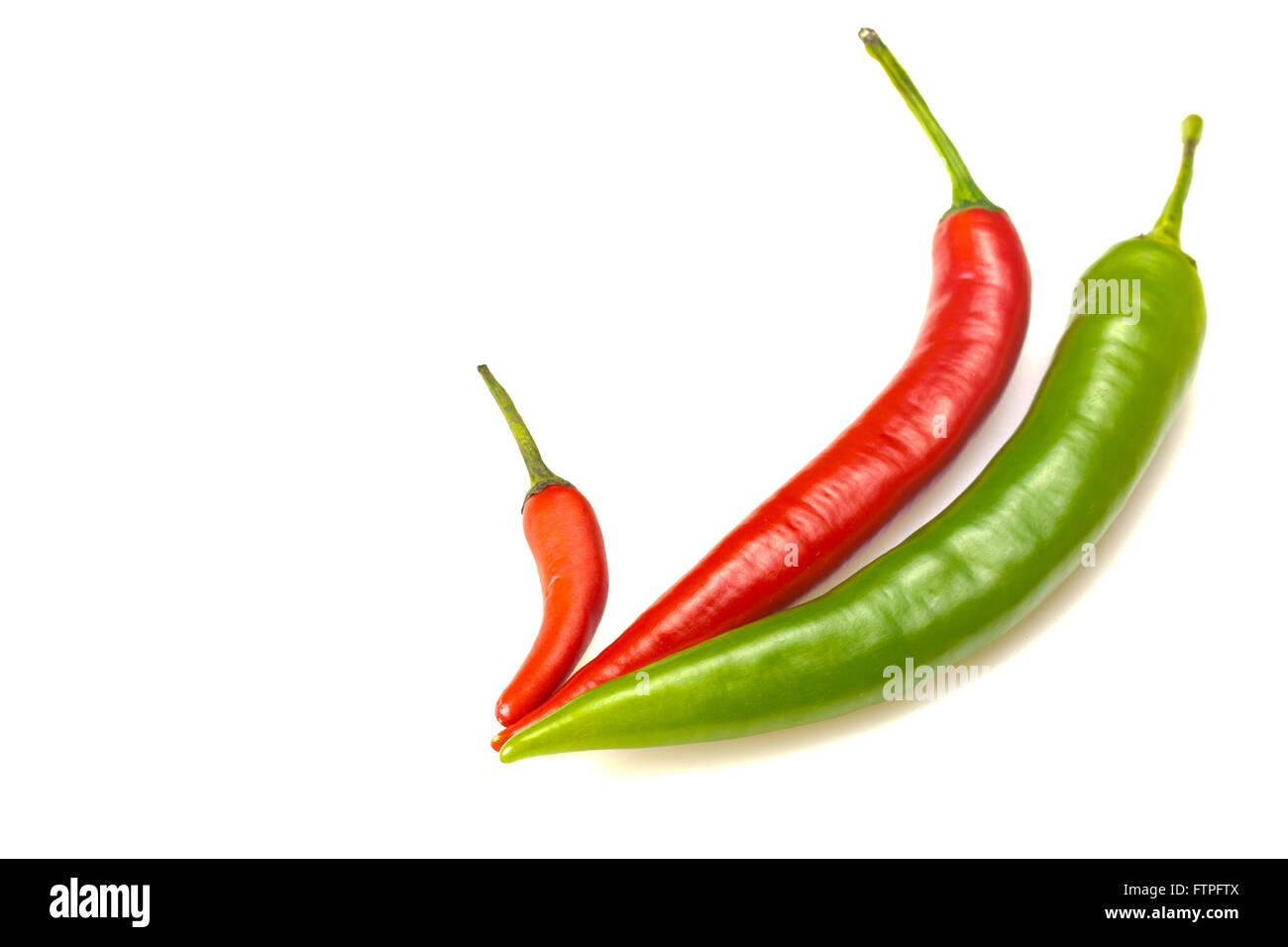 Group of green and red chilli peppers. Isolated Stock Photo - Alamy