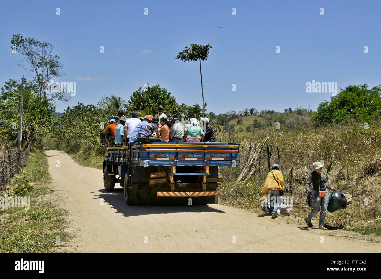 Truck carrying people on dirt road in rural area - region of Vale do Paraiba Stock Photo