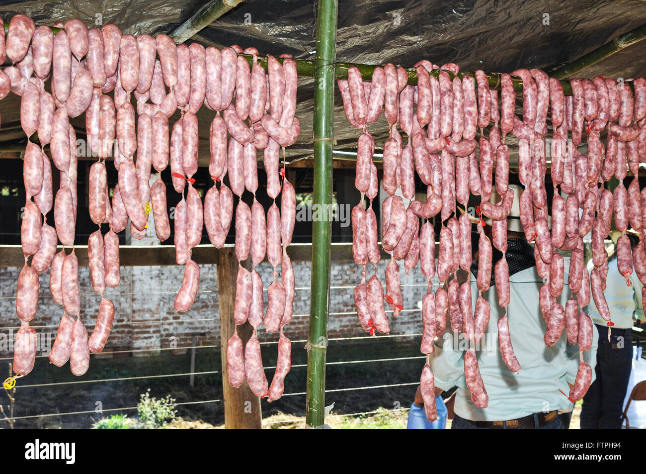Sausages on exhibition in the party tent entourage Burn A Garlic Stock Photo