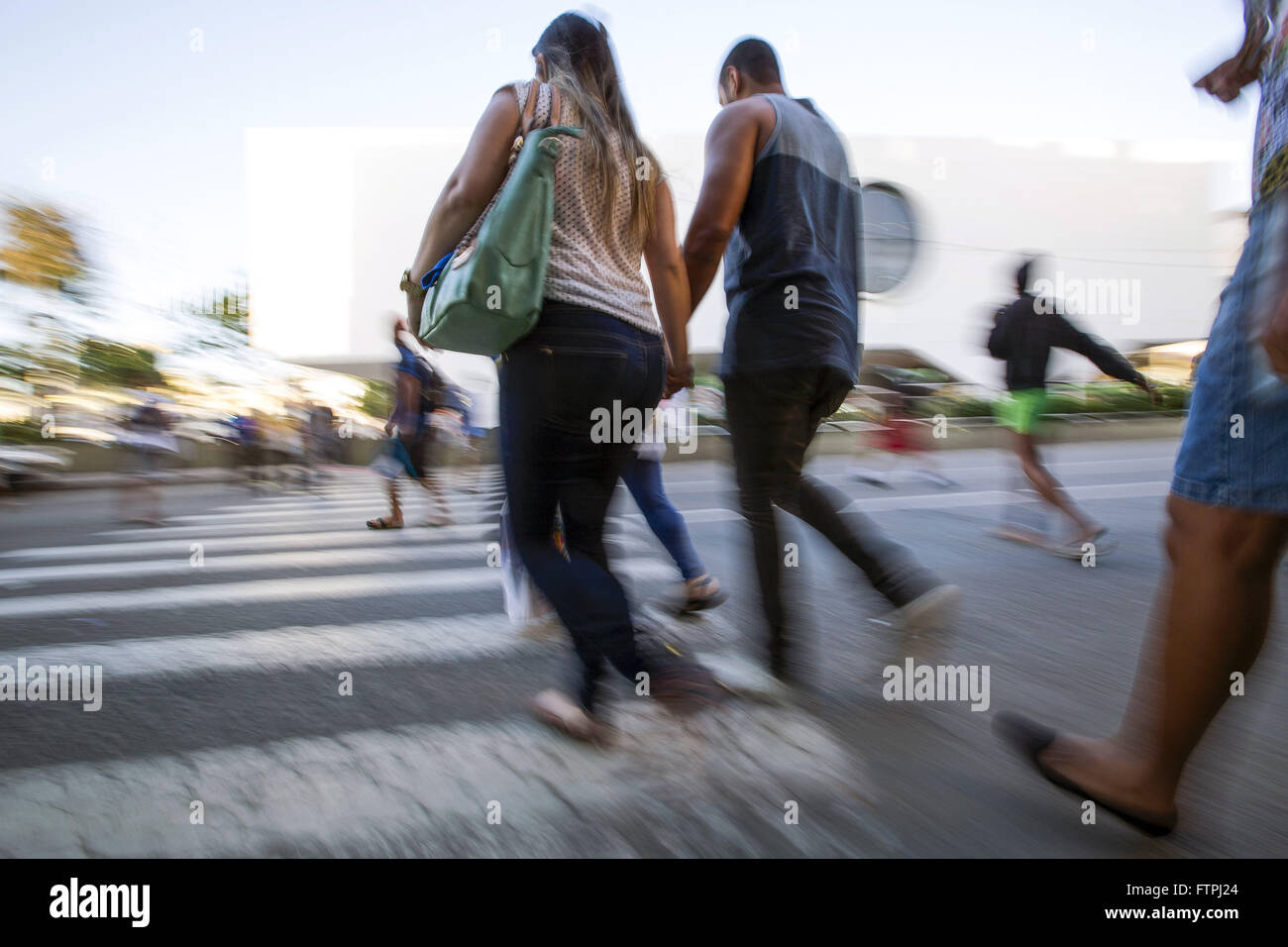 Pedestrians crossing street in the city center Stock Photo