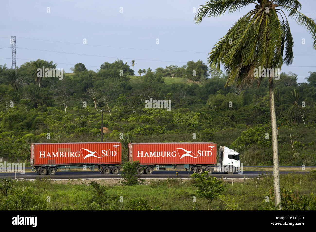 Cargo truck traveling on highway Stock Photo