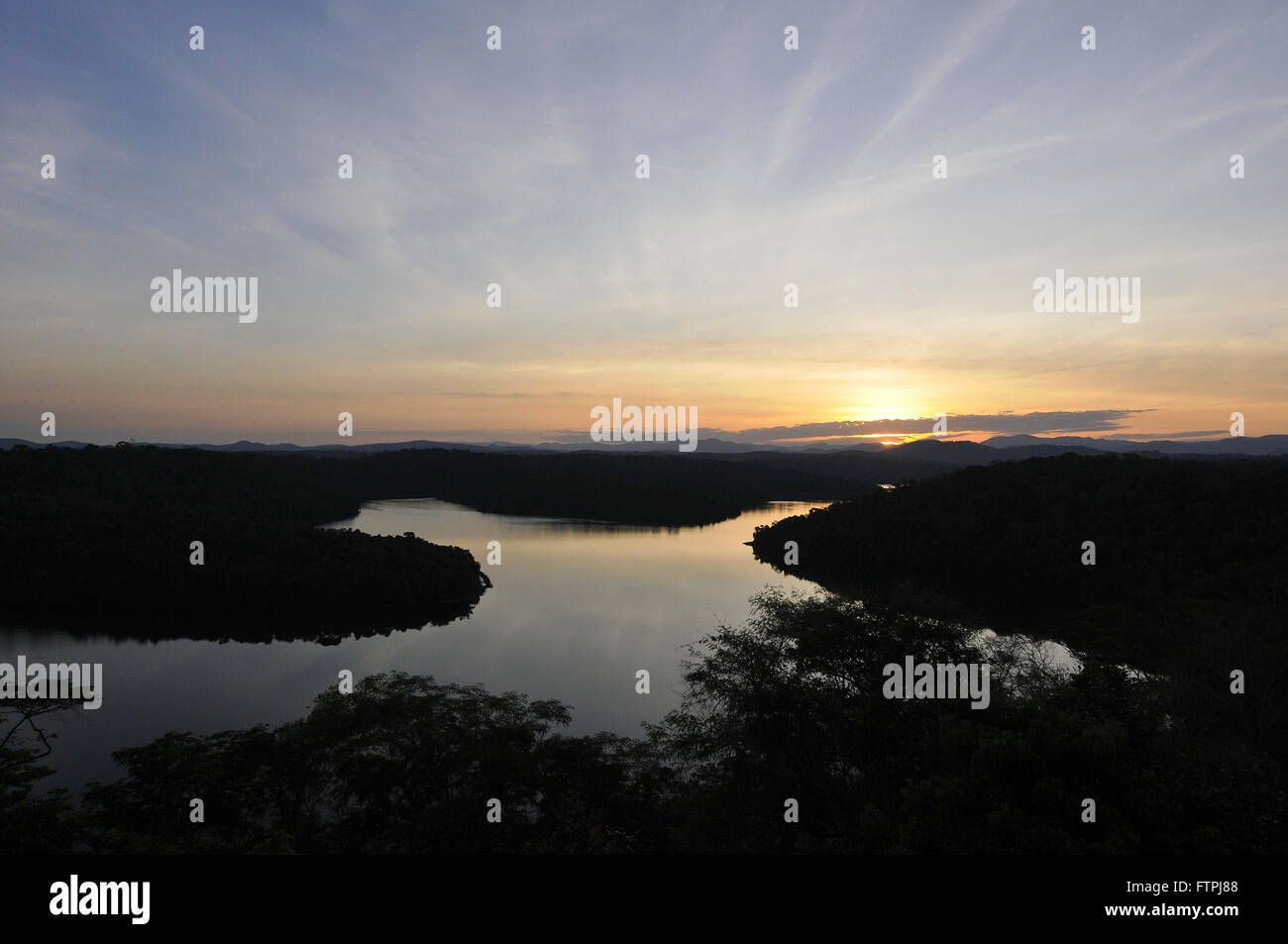 Landscape with sunset view over the Lagoon Sun Helvecio the Rio Doce State Park Stock Photo