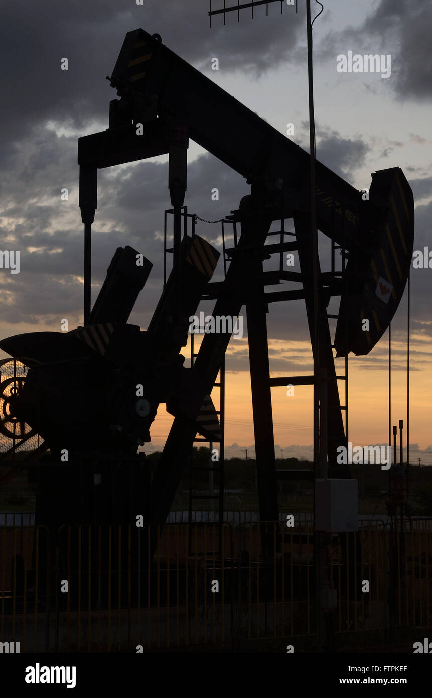 Unit poco pumping oil producer in the margin of the RN-221 highway Stock Photo