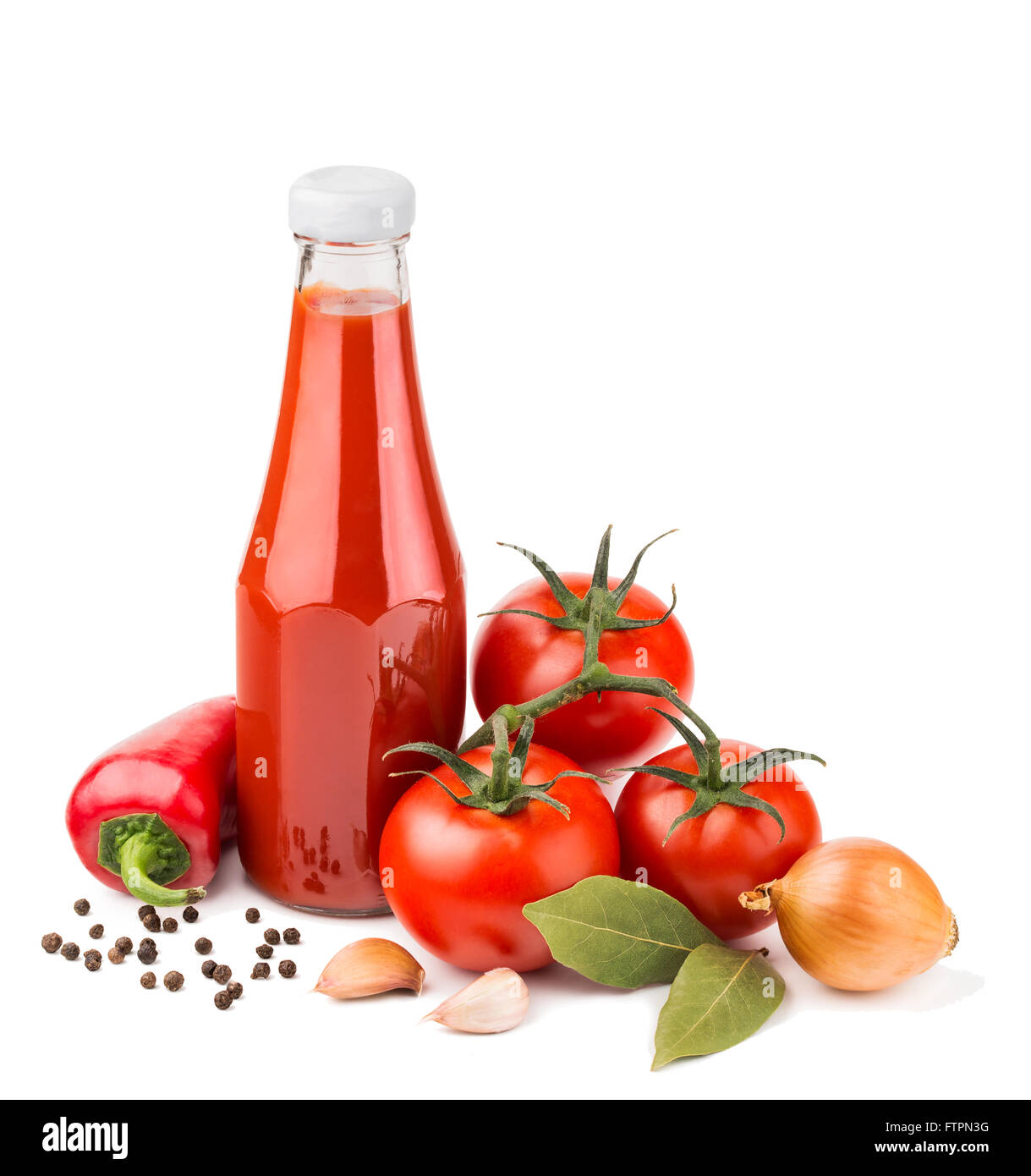 Bottle of ketchup and raw ingredients isolated on white Stock Photo