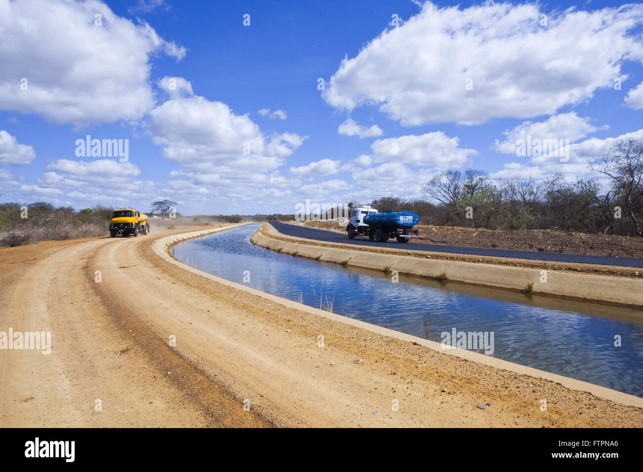 Pipa the Transaction truck carrying water captured in the canal Depth Project Stock Photo