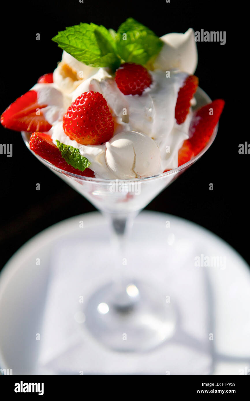Strawberry dessert with whipped cream and sigh Stock Photo