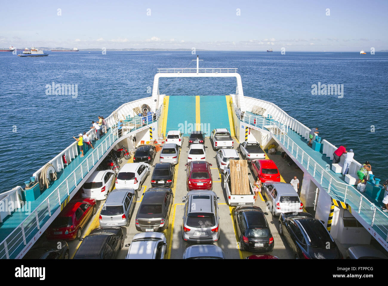 Car on board the ferry makes the crossing between the city and the Island of Itaparica Stock Photo