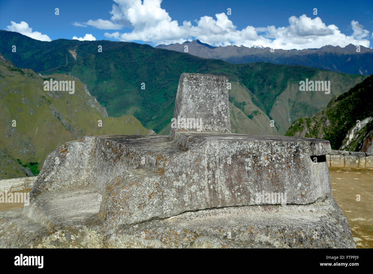 Intihuatana Rock (Hitching Post of the Sun), Machu Picchu Inca ruins, near Machu Picchu Pueblo (Aguas Calientes), Cusco, Peru Stock Photo