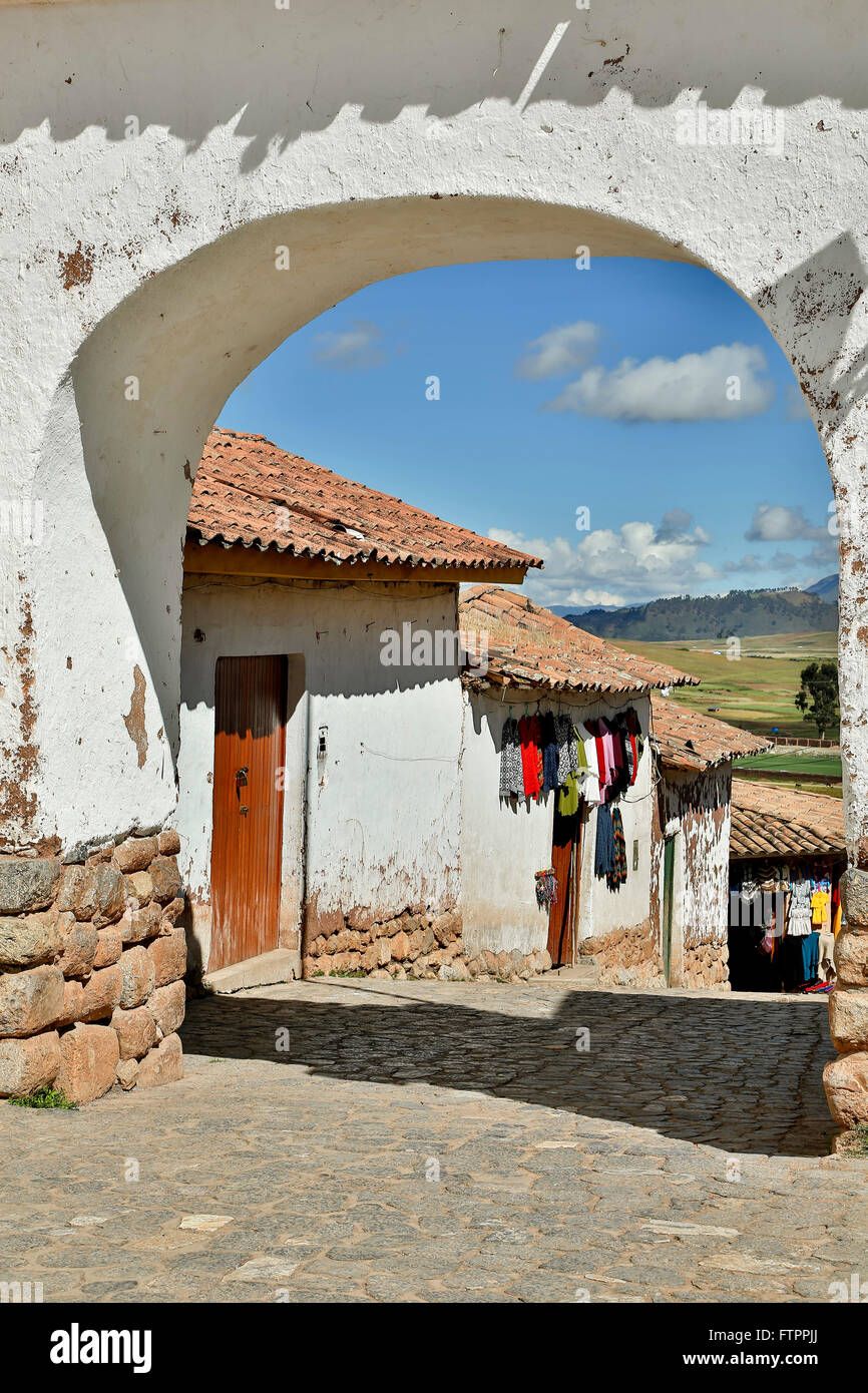 Arched entryway and houses, Chinchero, Cusco, Peru Stock Photo