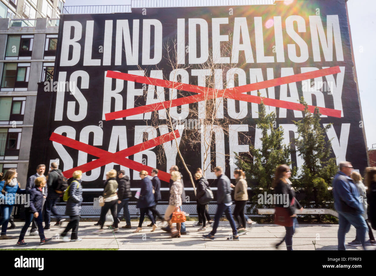 'Untitled (Blind Idealism Is...) by the artist Barbara Kruger on display along the High Line Park in New York on Sunday, March 27, 2016. The work is an adaptation of a quote from  philosopher Frantz Fanon which has been used in a number of the artists' works. (© Richard B. Levine) Stock Photo