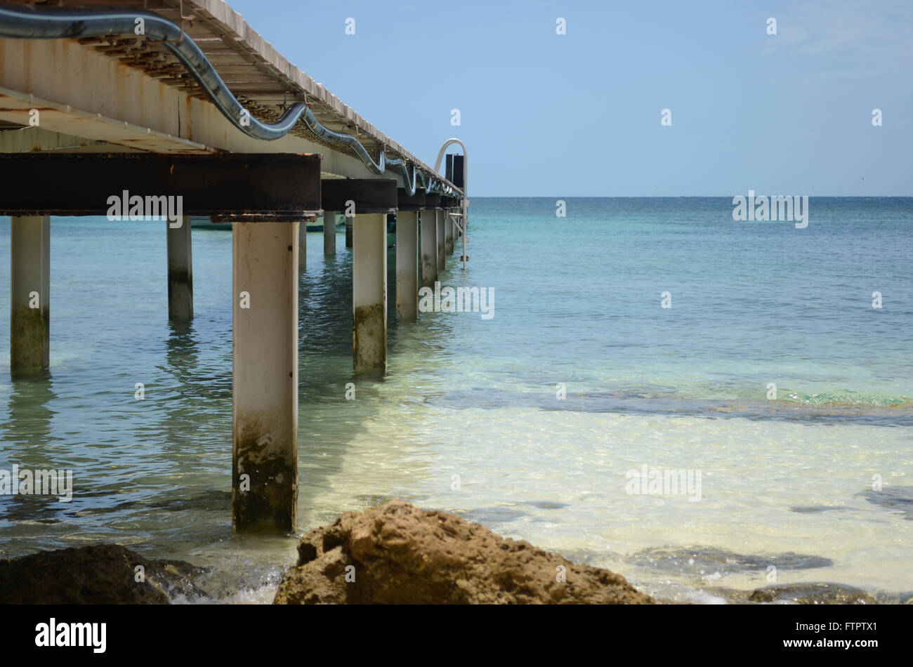 A wooden jetty stretching into the sea Stock Photo - Alamy