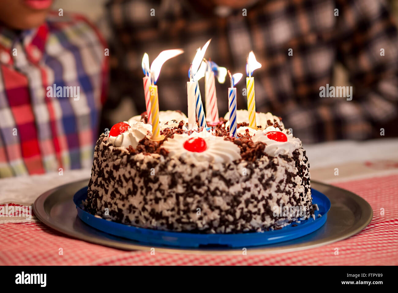 Cake's candles being blown out Stock Photo Alamy