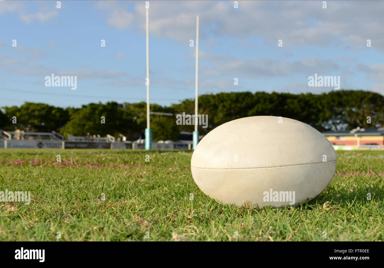 Rugby Ball in front of the goal posts Stock Photo Alamy