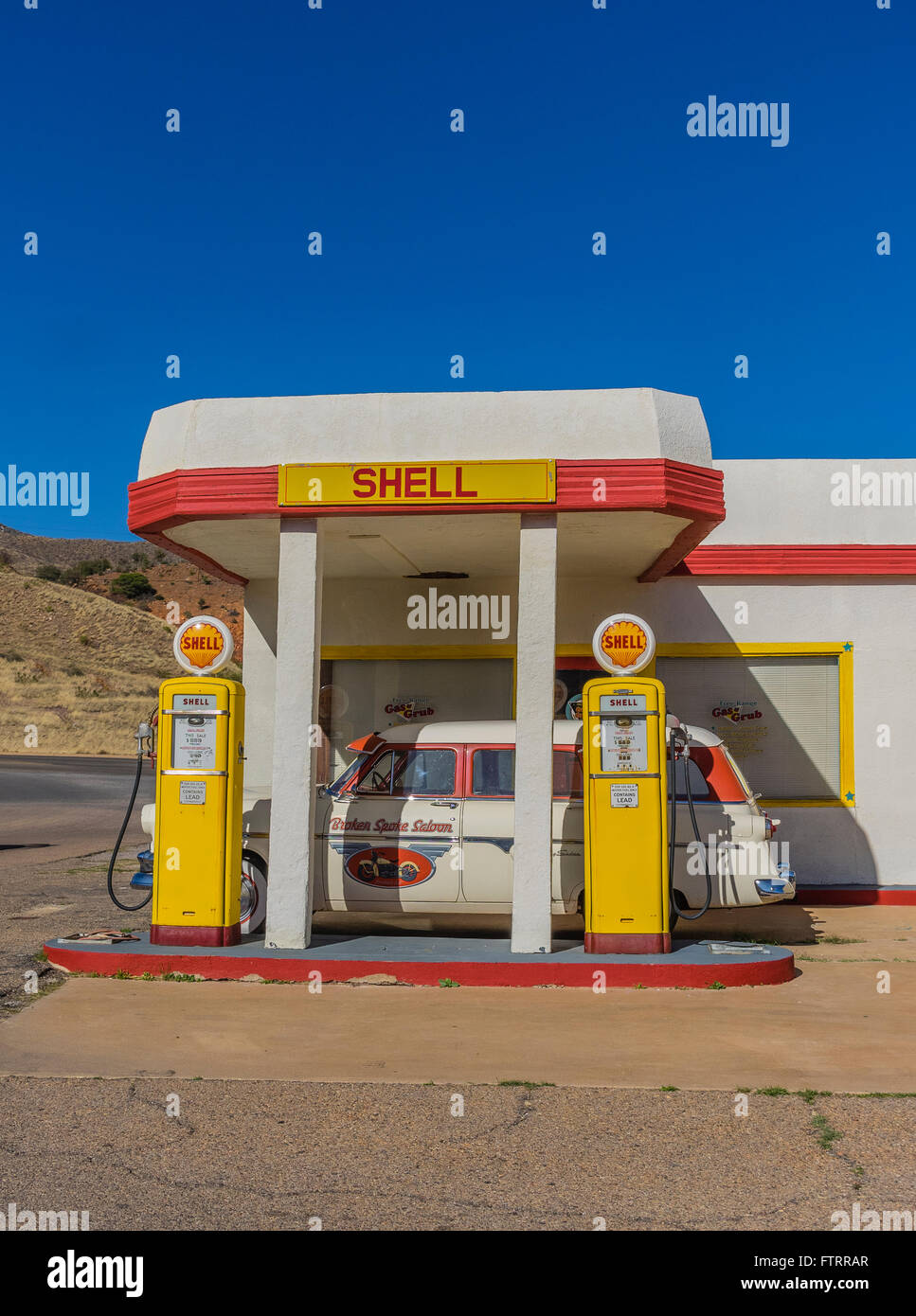 Classic 1950s Shell Gas Station painted yellow and red in Shell's
