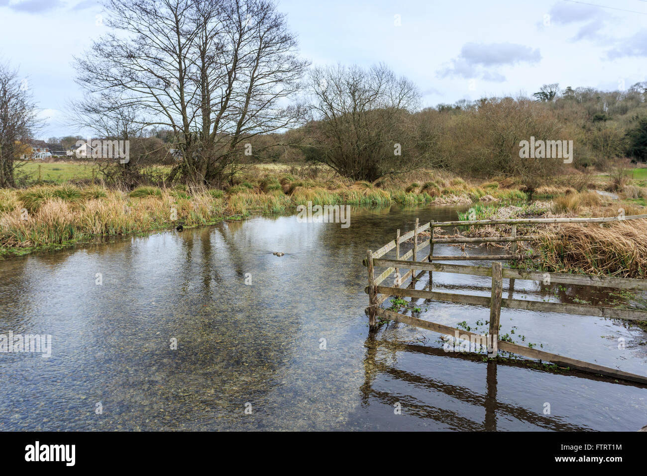 The River Test flowing in Stockbridge, Hampshire, southern England, in winter Stock Photo