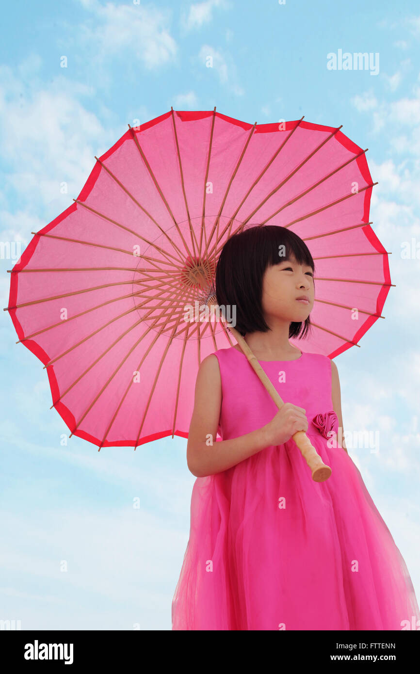 Asian girl in pink dress Stock Photo