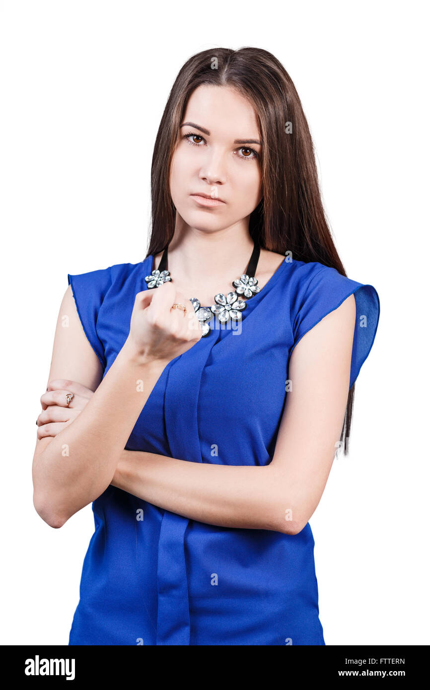 Young woman shows threaten fist Stock Photo