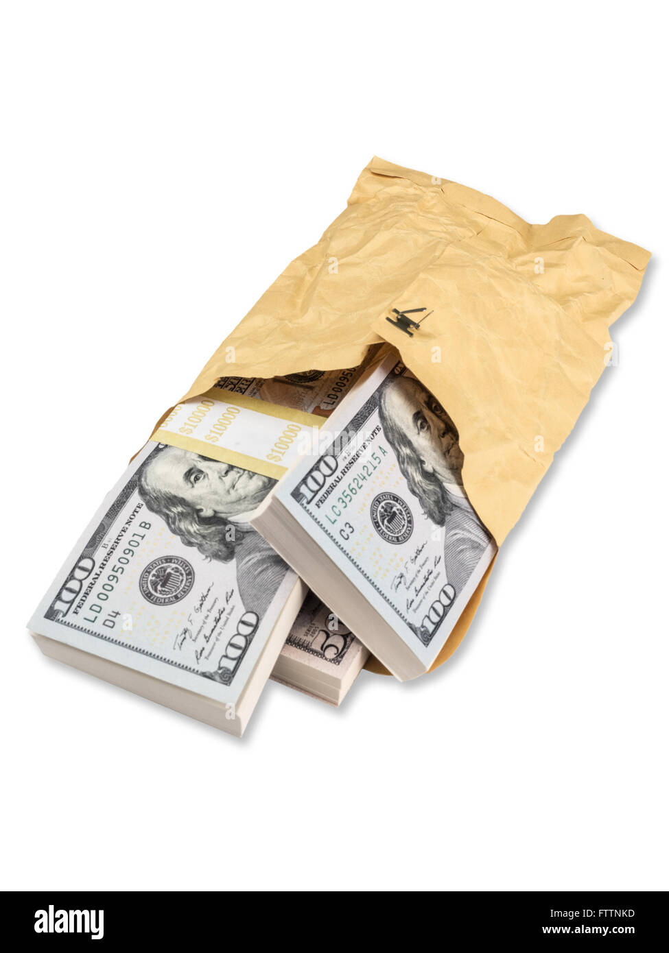 Photograph of large amount of crisp U.S. paper currency stuffed into a wrinkled brown envelope, suggesting an illicit transactio Stock Photo
