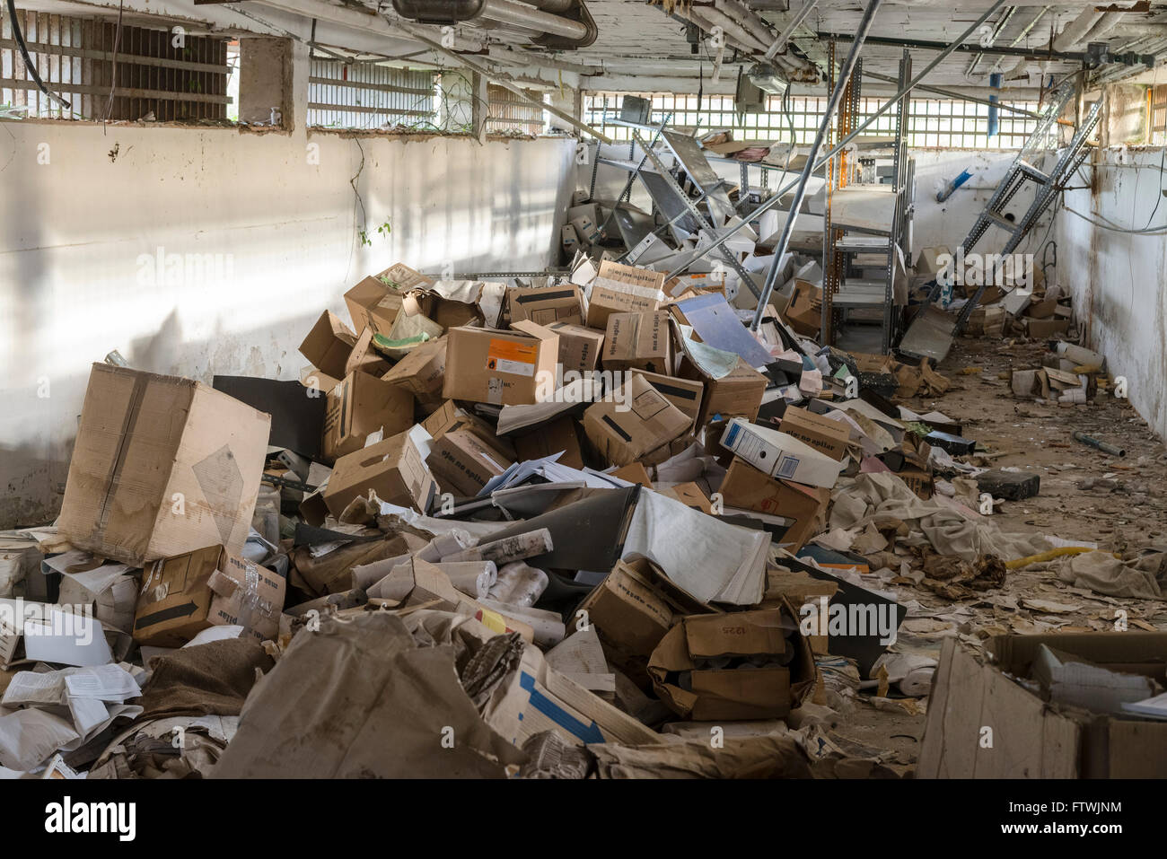 MESSY WAREHOUSE TOTALLY BROKEN AND DISORGANIZED Stock Photo