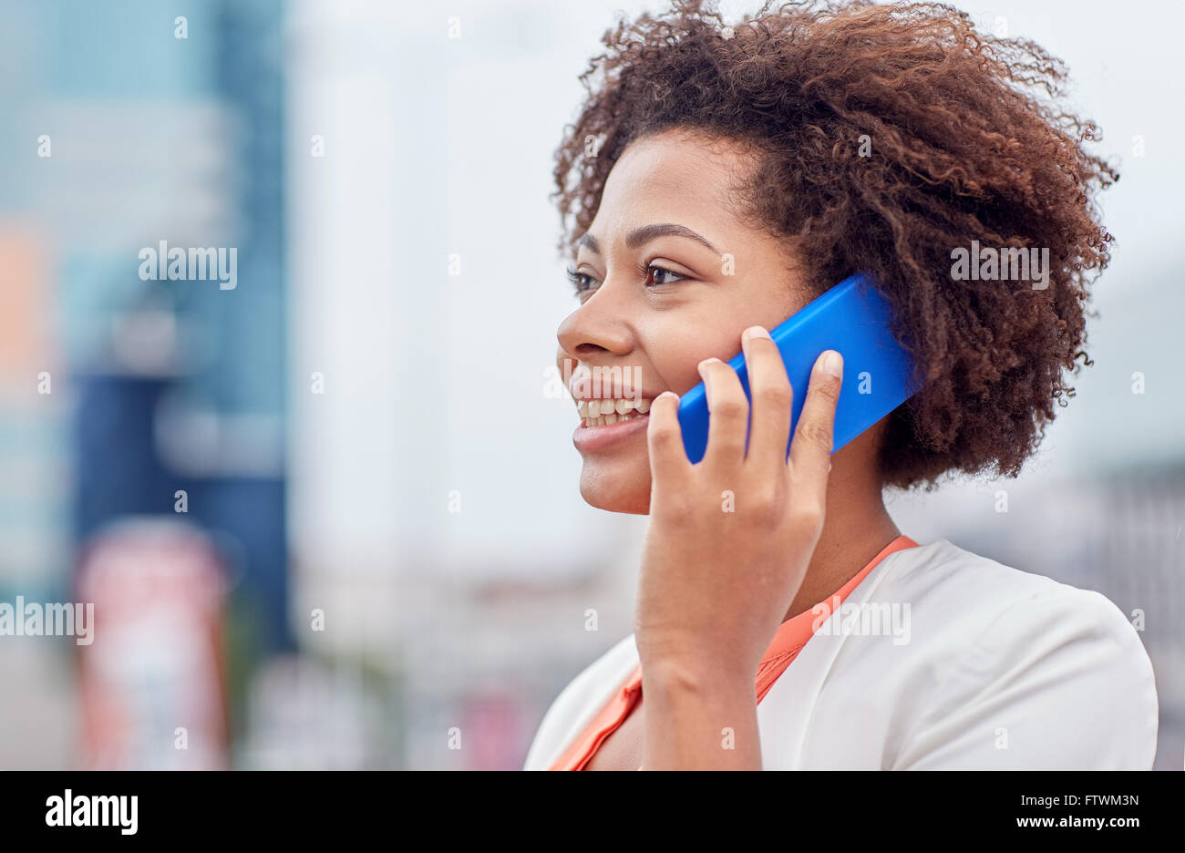 happy young african american businesswoman in city Stock Photo - Alamy