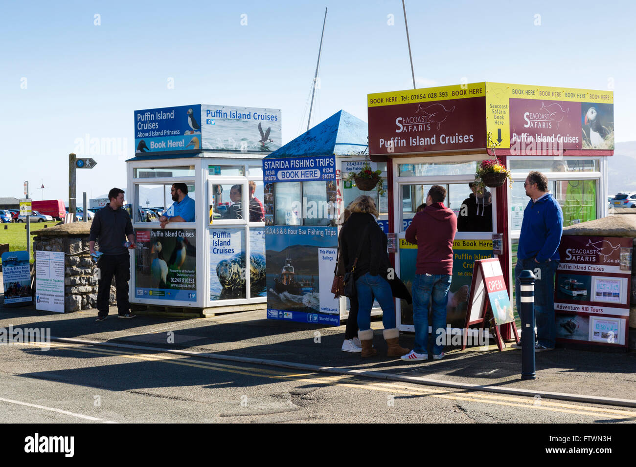 Boat and fishing tour kiosks, Beaumaris, Anglesey Stock Photo