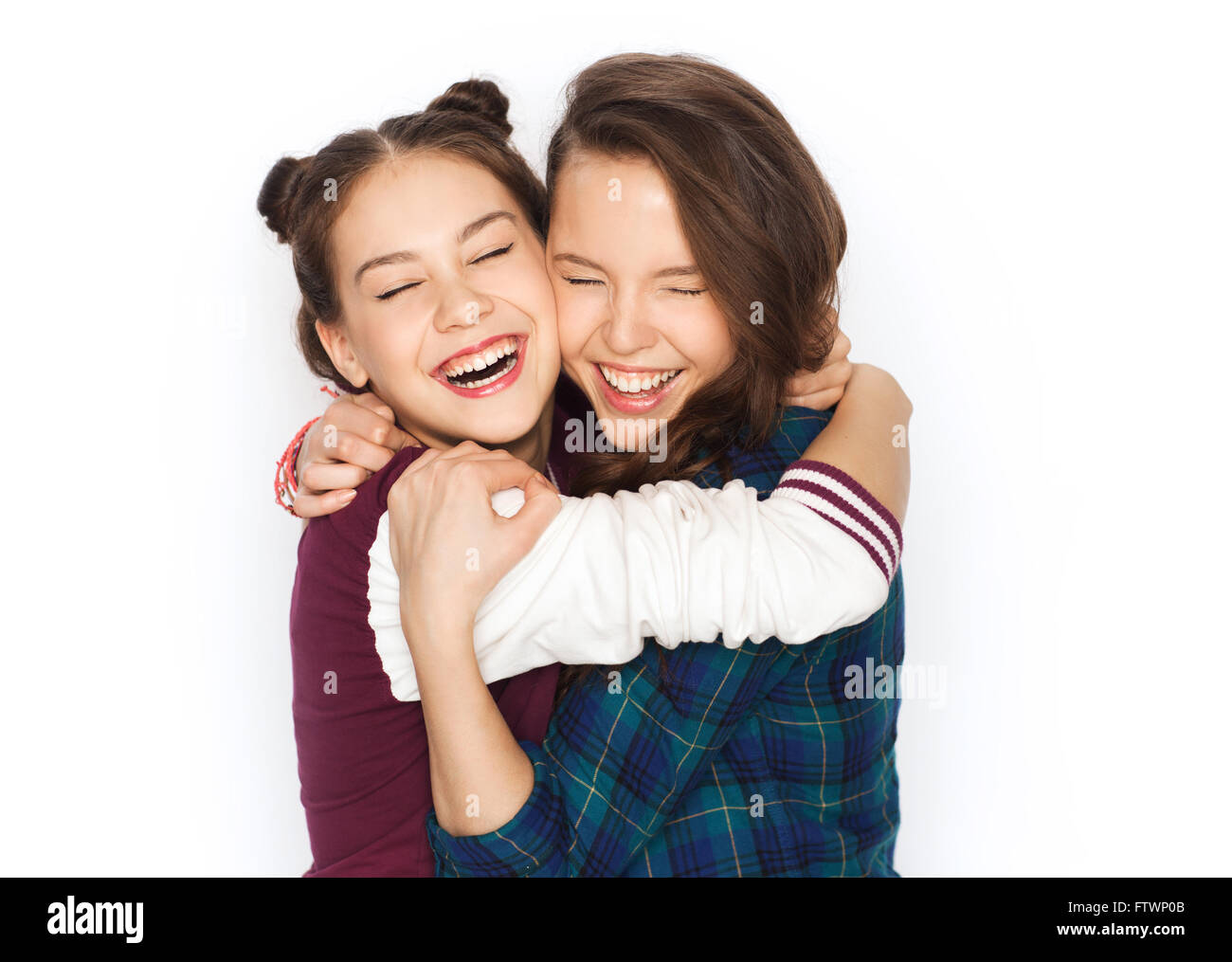 happy smiling pretty teenage girls hugging Stock Photo - Alamy