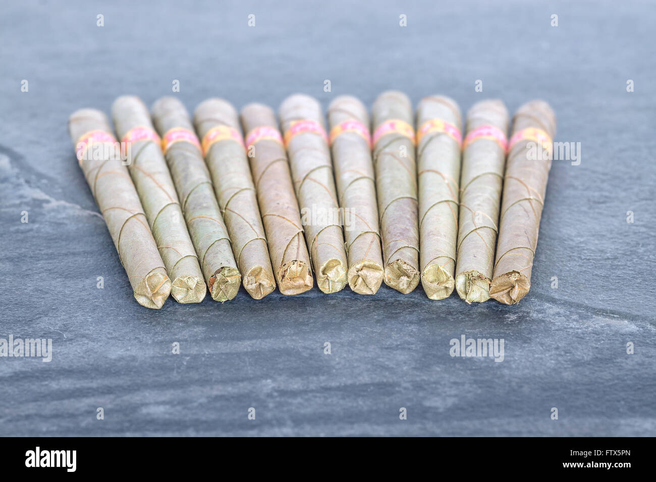 beady cigarette Cheap cigarette india hi-res stock photography and images