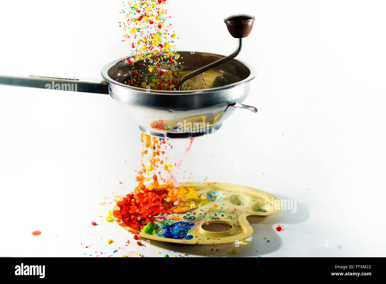 Conceptual food being pureed through a moulin Stock Photo