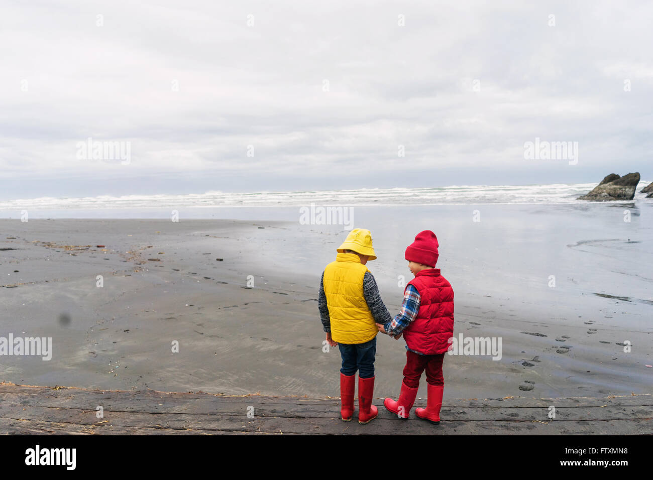 Two Boys Holding Hands High Resolution Stock Photography and Images - Alamy