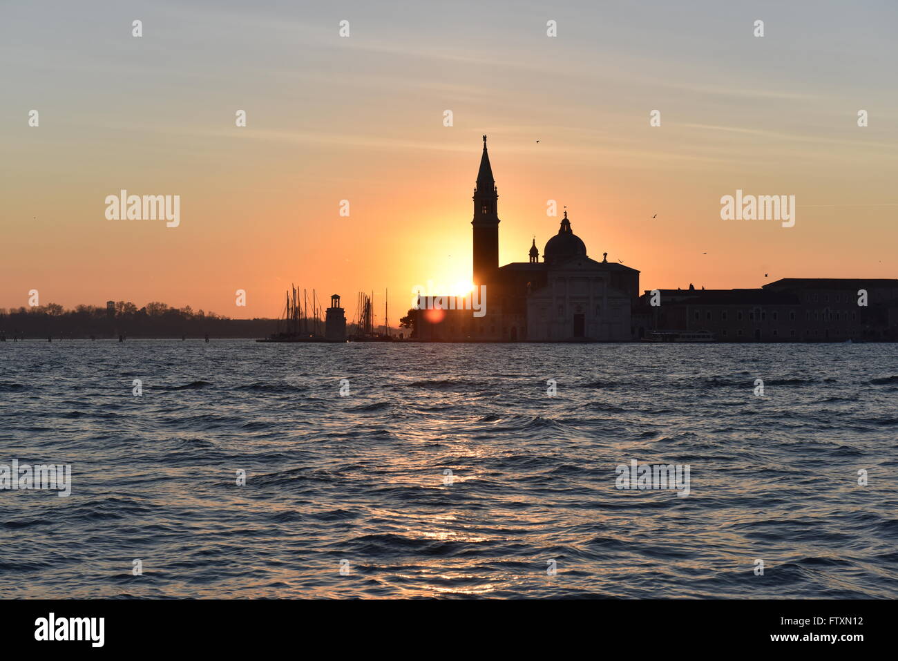 Silhouette of City skyline at sunrise, Venice, Italy Stock Photo