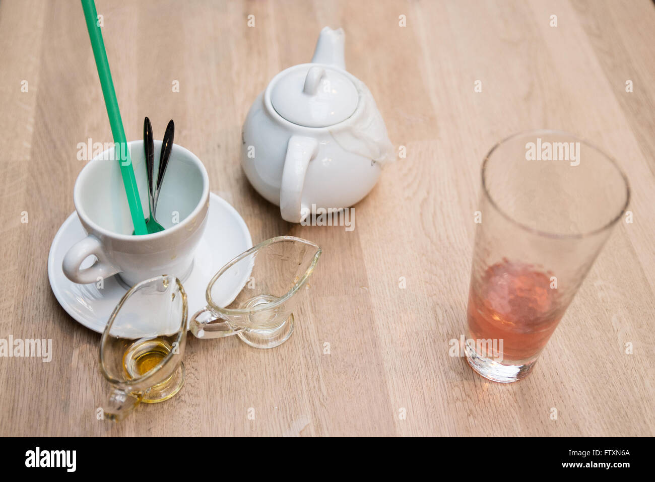 Used cups, glasses and jugs on a table Stock Photo Alamy