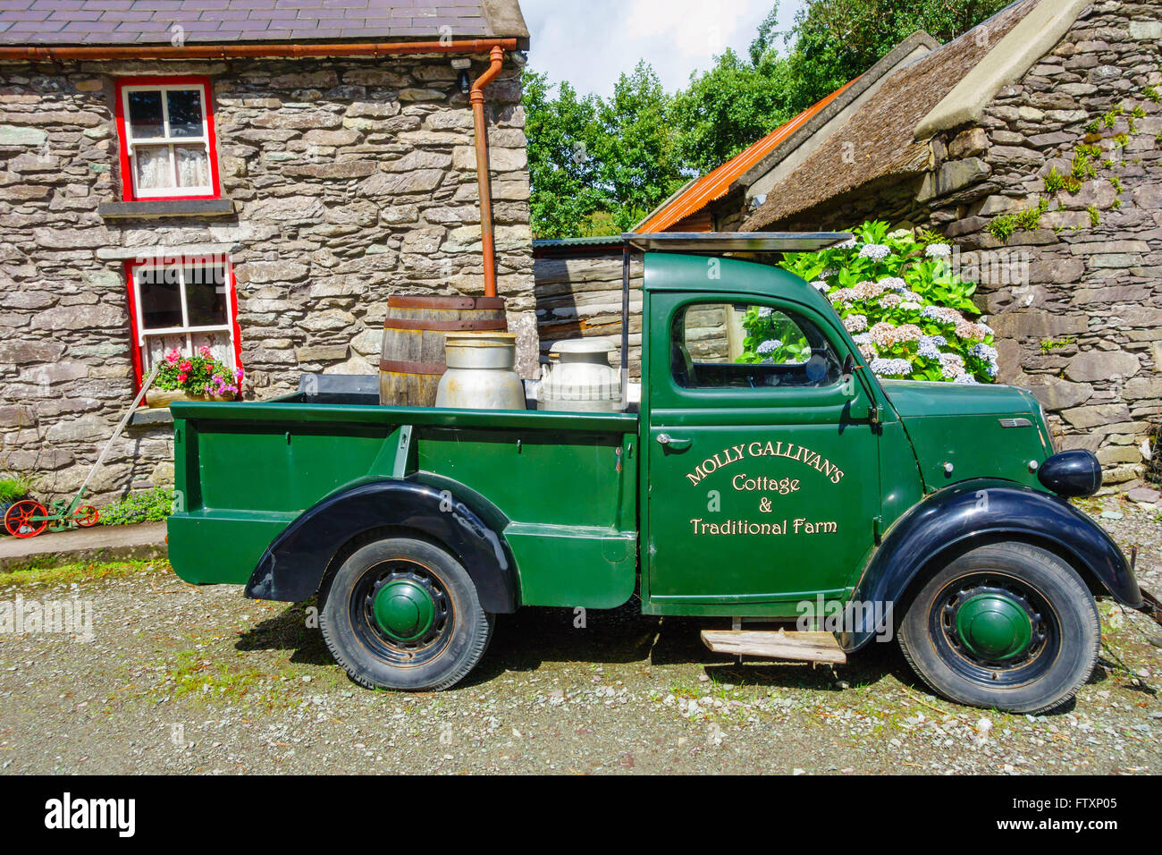 A classic Ford pickup outside  Molly Gallivan's Cottage Kenmare County Kerry Ireland Stock Photo