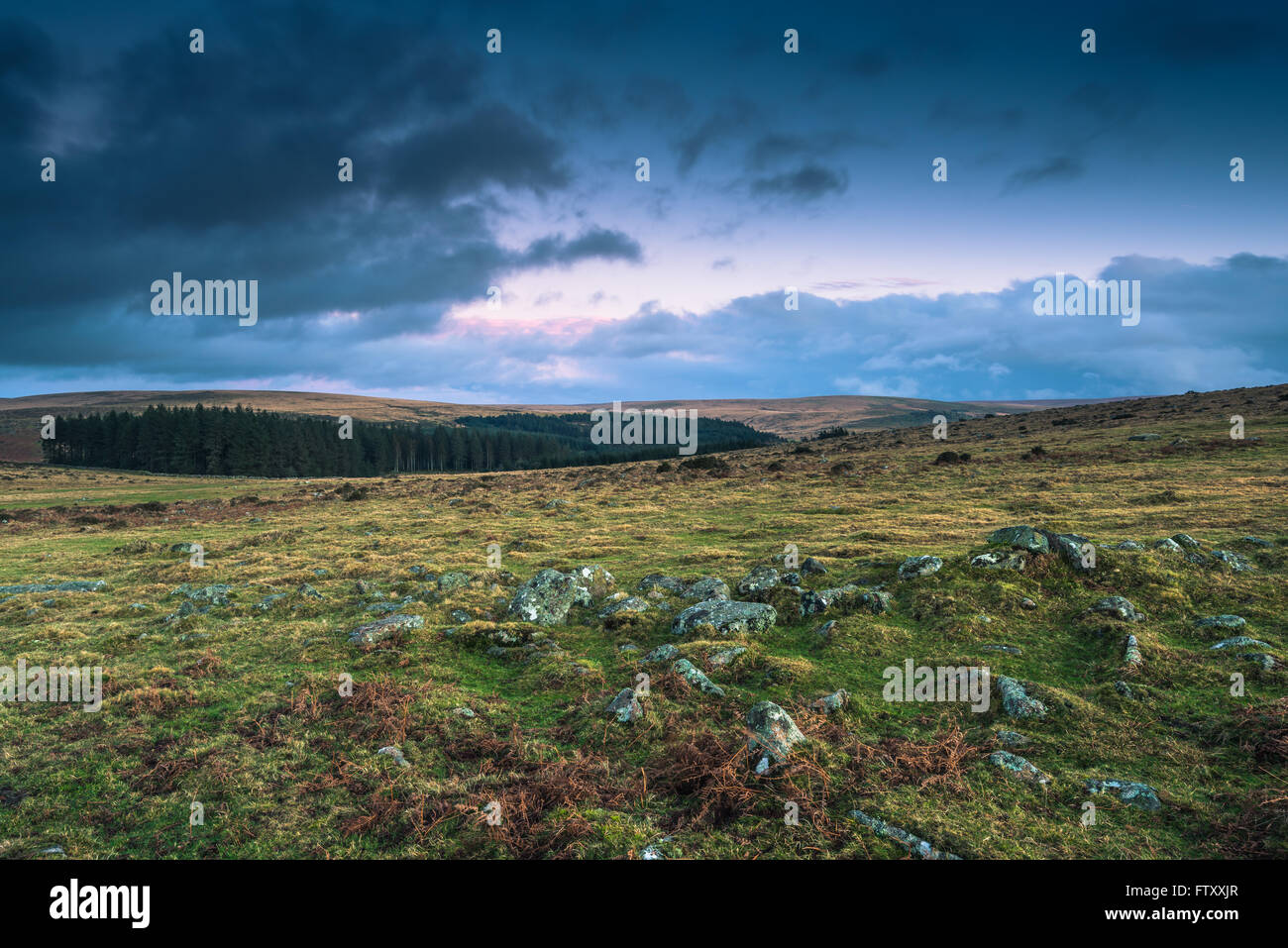 Dramatic clouds over wild moorland landscape in Devon, UK Stock Photo