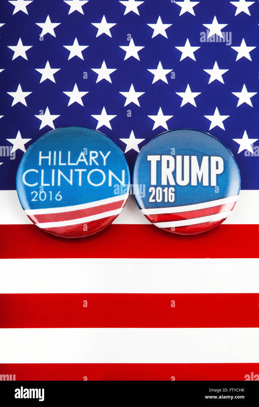Hillary Clinton and Donald Trump pin badges over the American flag
