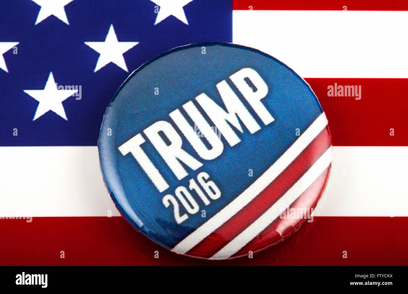 A Trump 2016 pin badge over the US flag symbolising Donald Trump’s ...