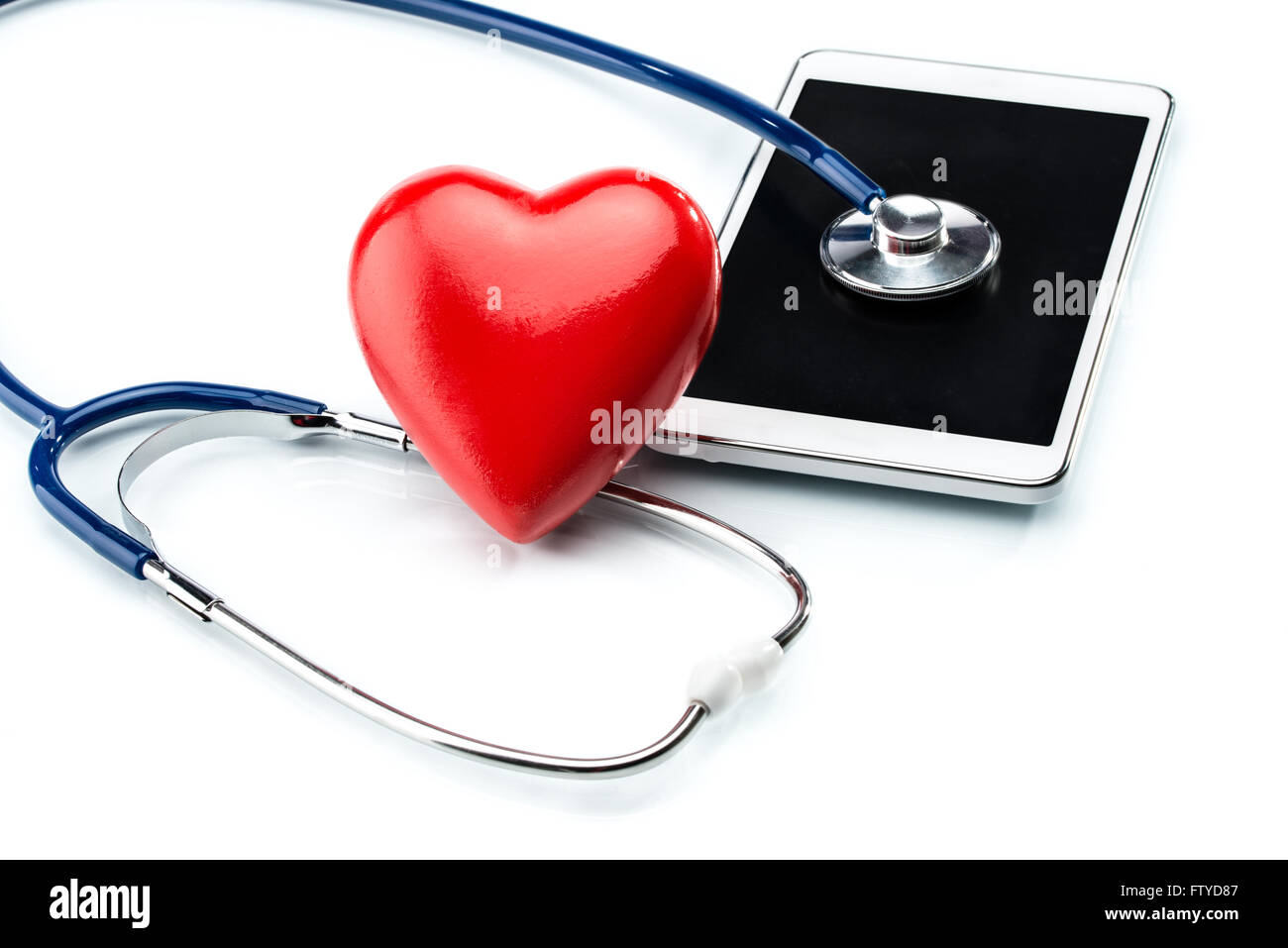 Cardiologist, stethoscope ,heart shape and Digital Tablet Stock Photo