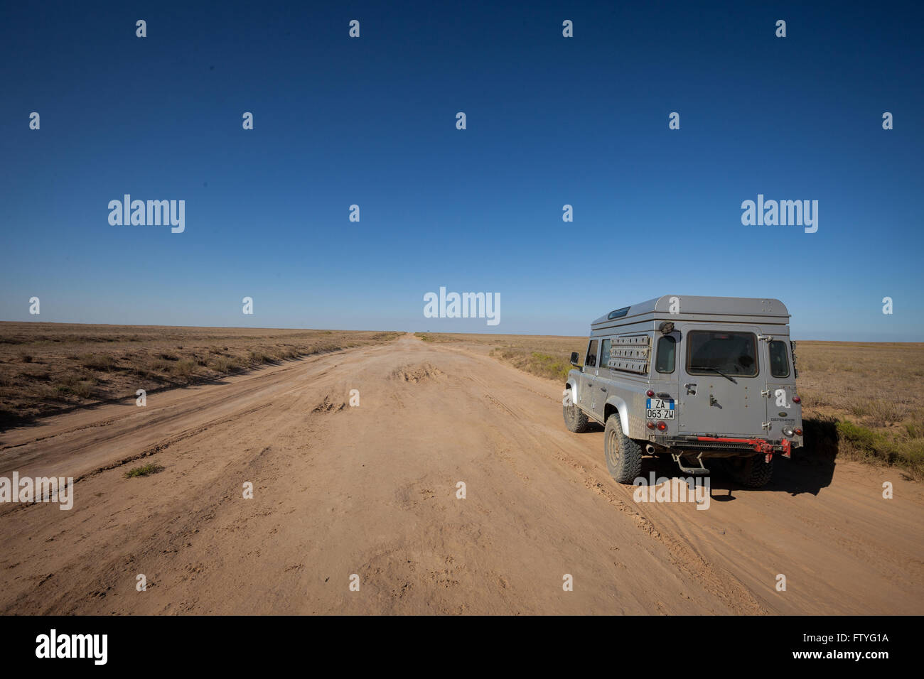 Kyrgyzstan, Kirghizistan, Asia, lonely travel,4WD, defender traveling in the steppe Stock Photo