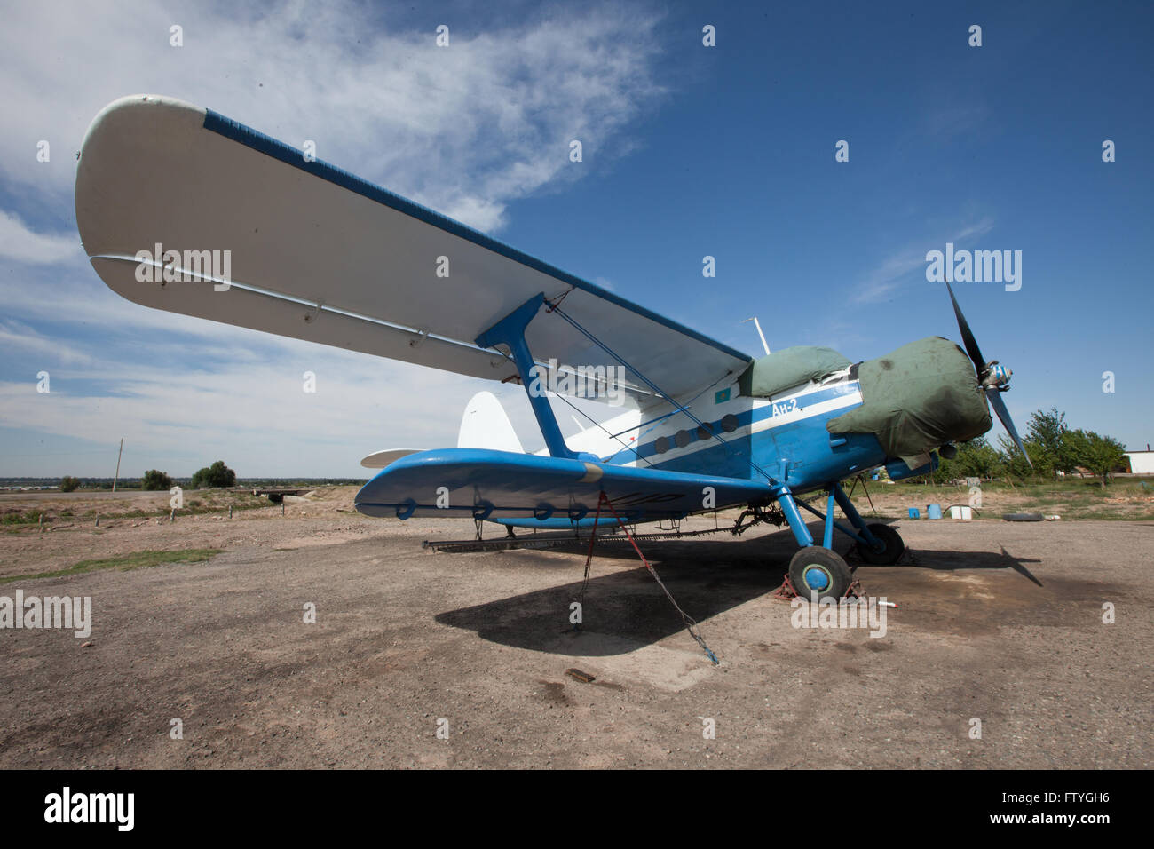 Kazakhstan, Kazakistan, Asia, landed agriculture airplane, biplane. Stock Photo